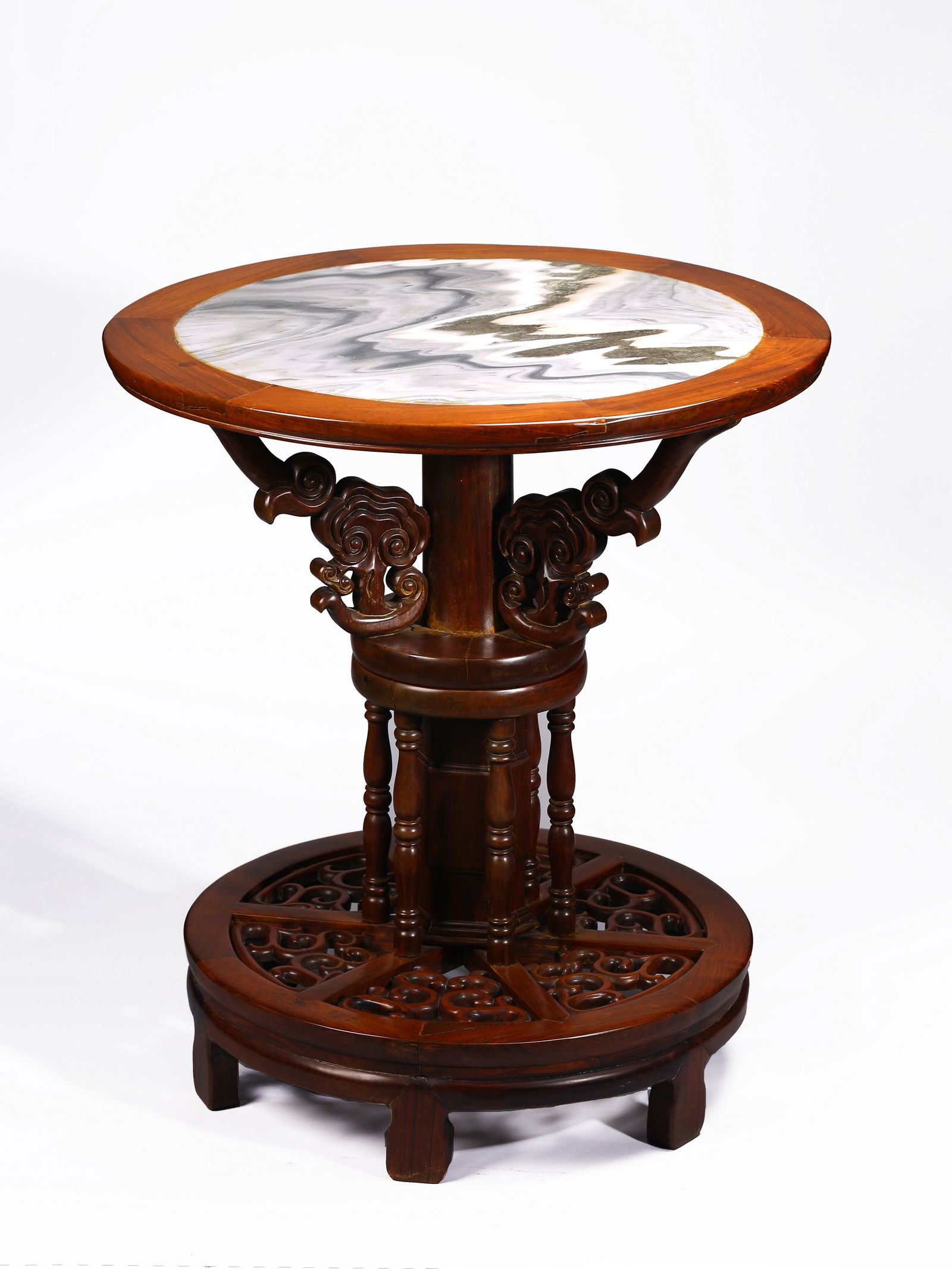 A Chinese Hardwood 'Marble' Inset Ruyi-Head Circular Table (1 of 10)
