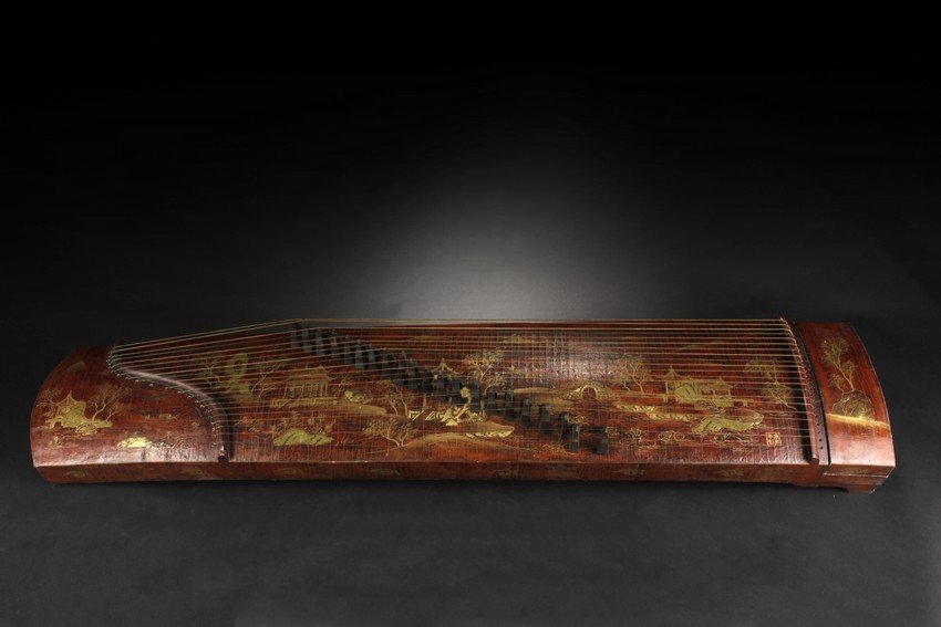 A CHINESE MUSICAL INSTRUMENT WITH 21 STRINGS
