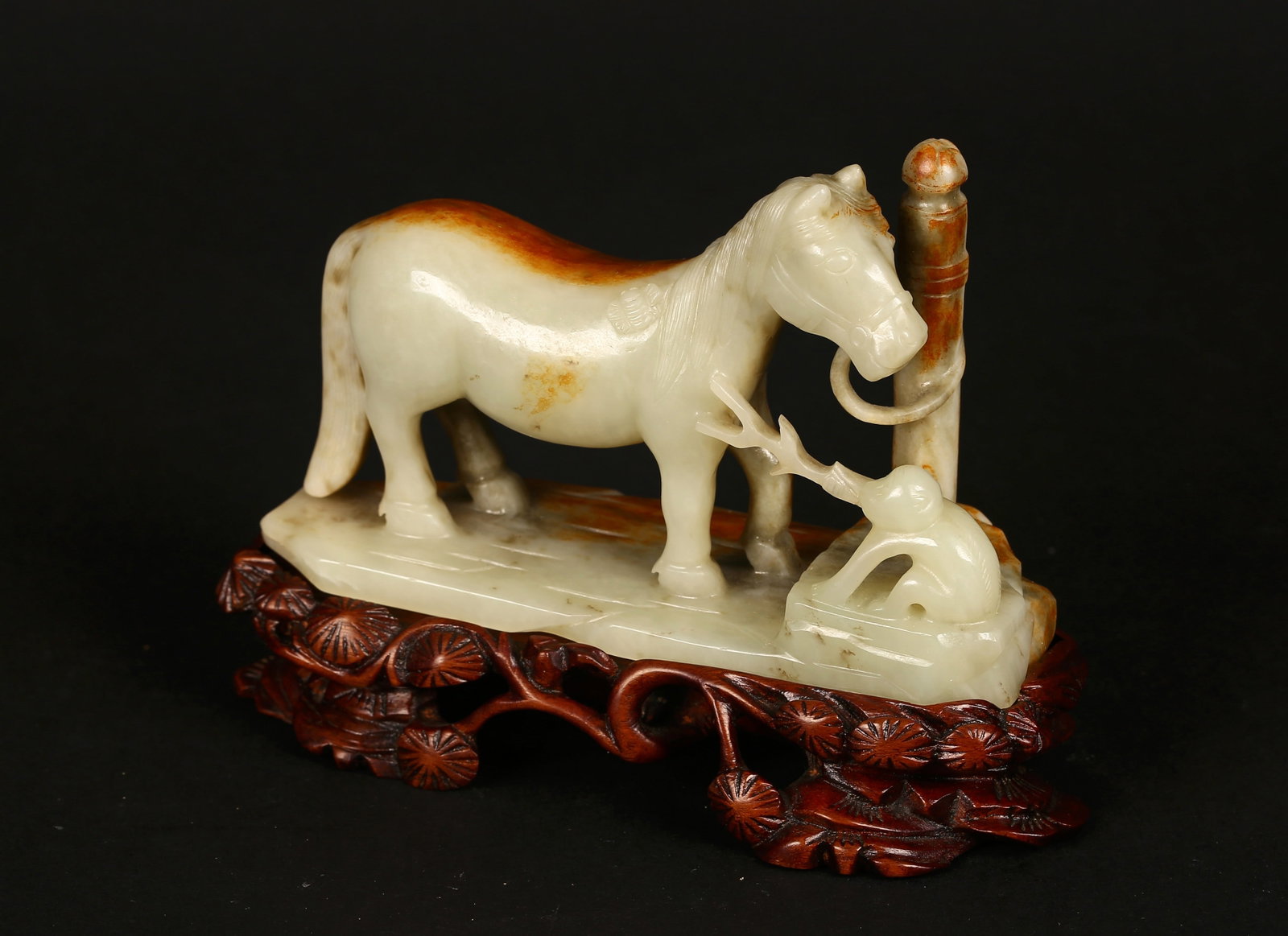 A Rare White Jade 'Monkey and Horse' Group (1 of 11)