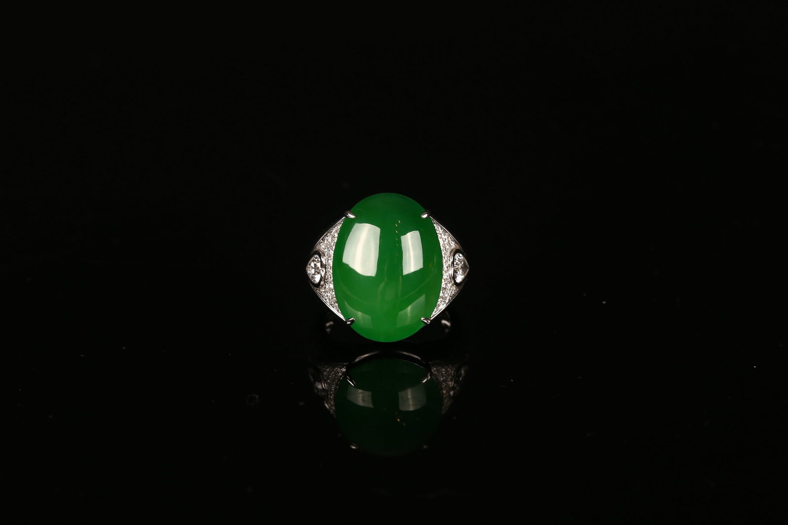 Natural Icy Green Jadeite and Diamond Pendant: 天然高冰鮮陽綠翡翠大蛋面鑽石戒指 Set with an impressive jadeite cabochon of “pigeon’s egg” pro