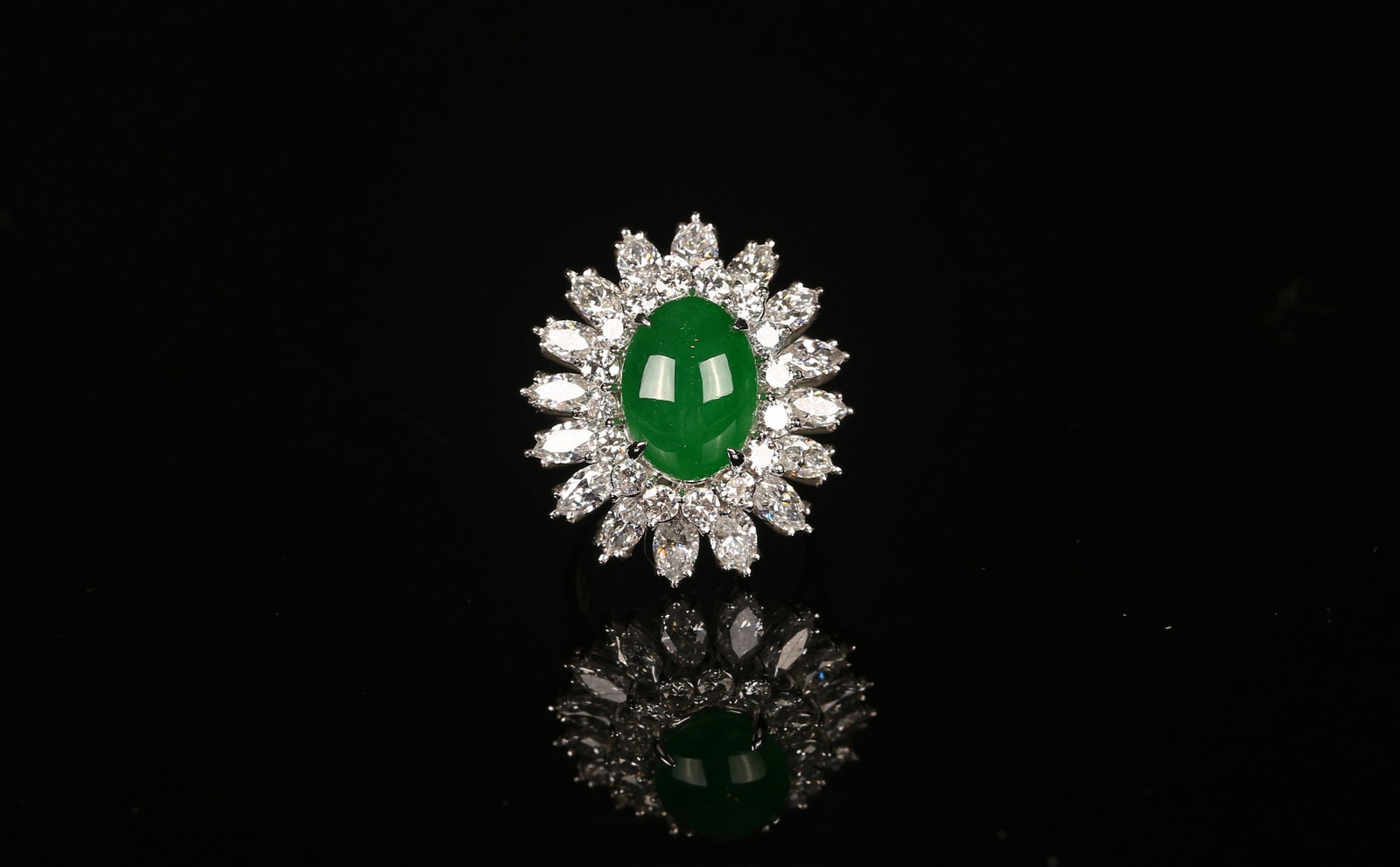 Natural Double-Convex Jadeite and Diamond Ring: 天然老坑種翡翠鑽石戒指 Set with a double cabochon jadeite of translucent texture and good clarity, measuring 13.05 x 9.75 x 5.35 mm, w
