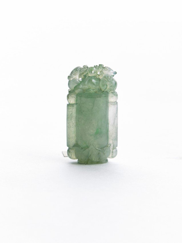 A JADEITE CARVED 'TIGER' PENDANT (1 of 4)