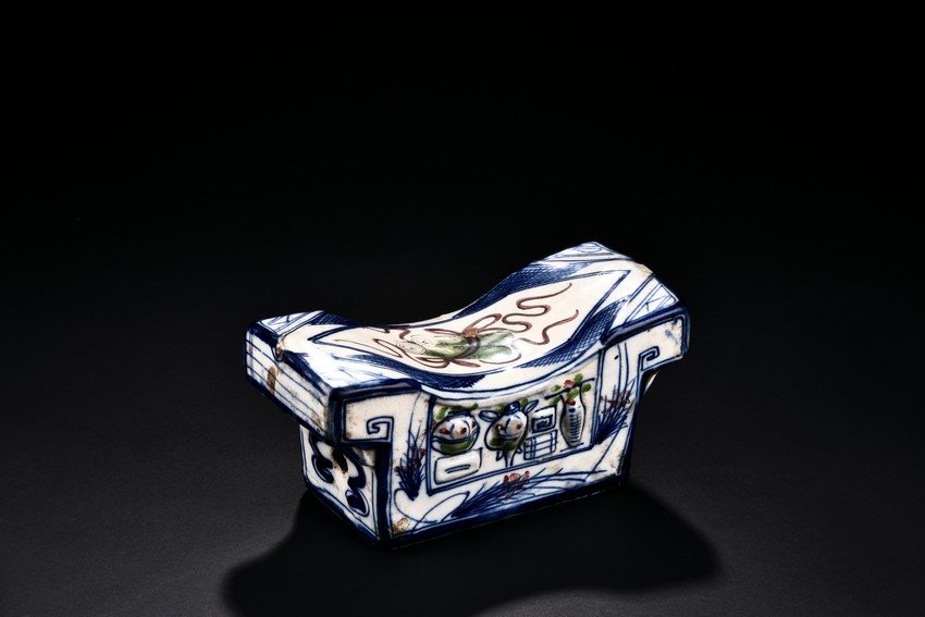 A BLUE AND WHITE POLYCHROME PORCELAIN PILLOW (1 of 8)