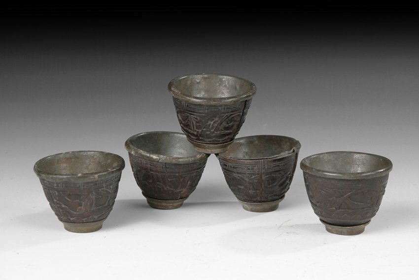 A SET OF FIVE COCONUT CUPS (1 of 4)