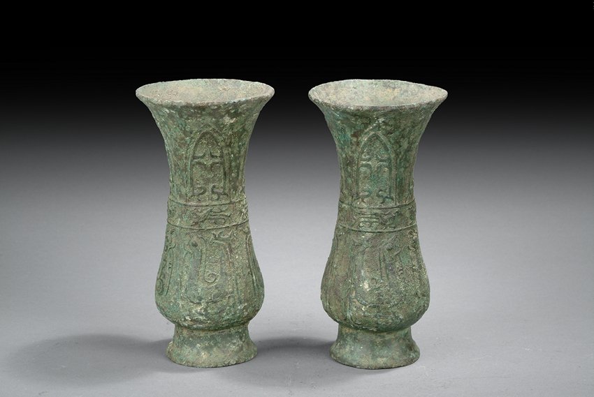 A PAIR OF ARCHAIC BRONZE 'PHOENIX' BOTTLES (1 of 5)