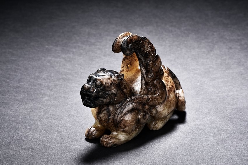 A ARCHAIC JADE CARVED FIGURE OF QILIN (1 of 5)