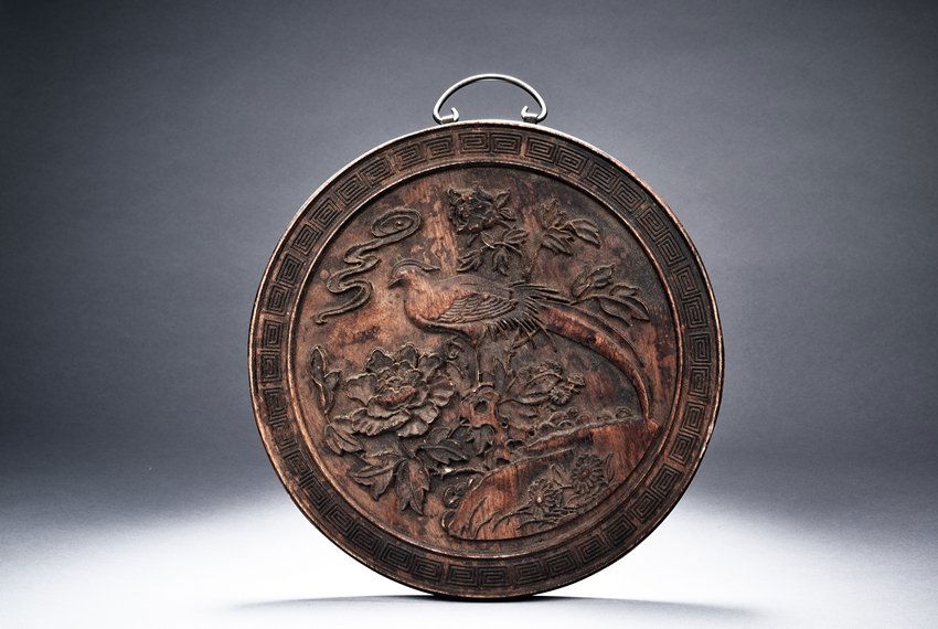 A WOOD CARVED CIRCULAR PANEL (1 of 5)