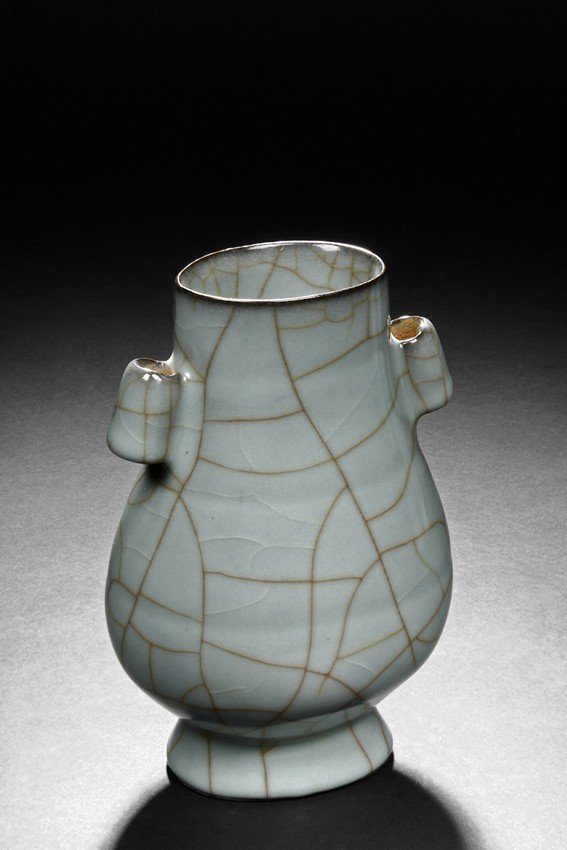 A CELADON GLAZED GUAN-TYPE VASE (1 of 9)