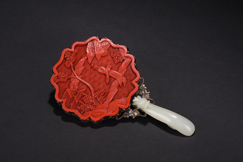 A CINNABAR LACQUER AND WHITE JADE HAND MIRROR (1 of 6)