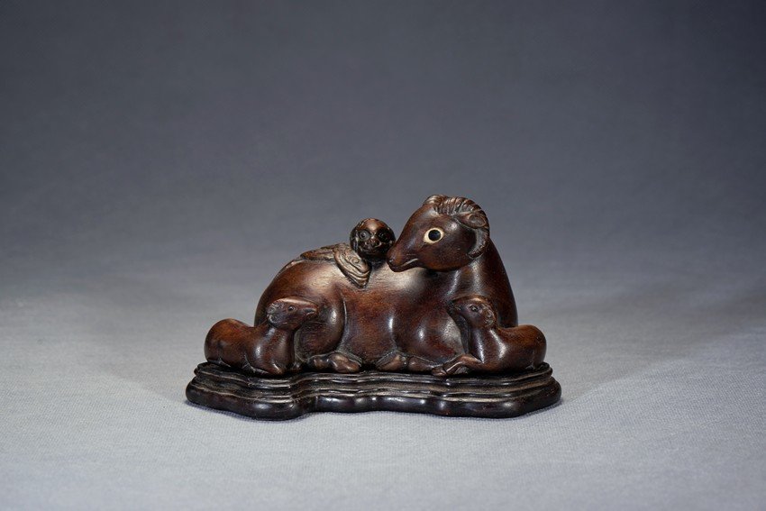 AN AGARWOOD 'THREE RAMS' CARVING (1 of 4)