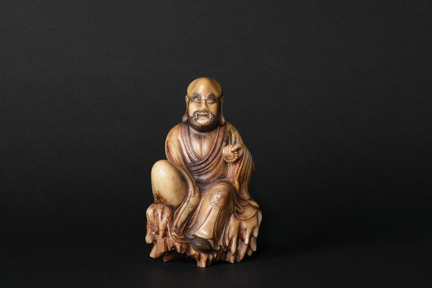 A SHOUSHAN STONE FIGURE OF LUOHAN (1 of 9)