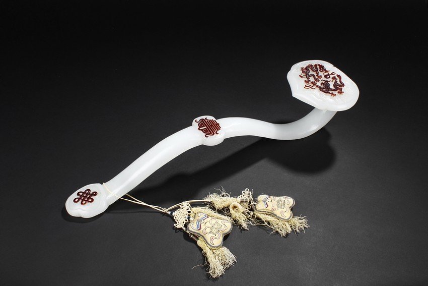 A RED OVERLAY WHITE GLASS RUYI SCEPTER (1 of 10)