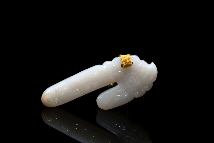 A WHITE JADE CARVED SCROLL CLASP (1 of 6)