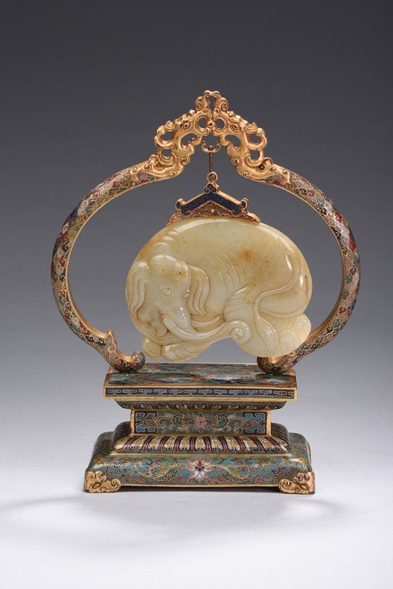 A WHITE JADE ELEPHANT WITH CLOISONNE ENAMEL STAND (1 of 9)