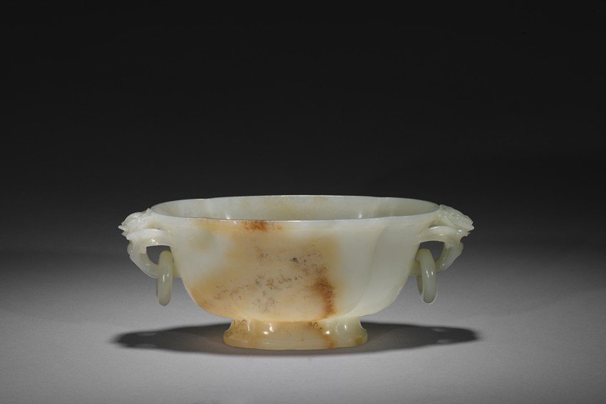 A WHITE AND RUSSET JADE VESSEL (1 of 8)
