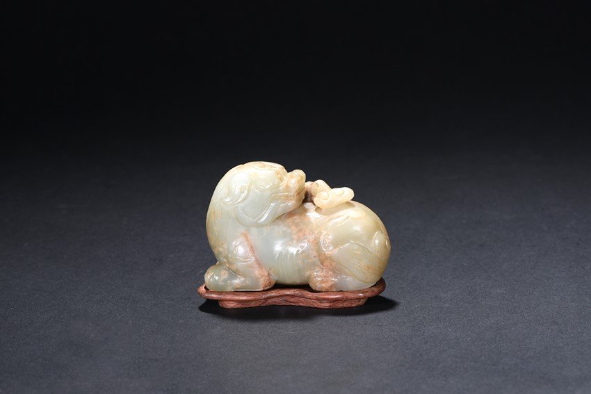 A WHITE AND RUSSET JADE MYTHICAL BEAST (1 of 7)