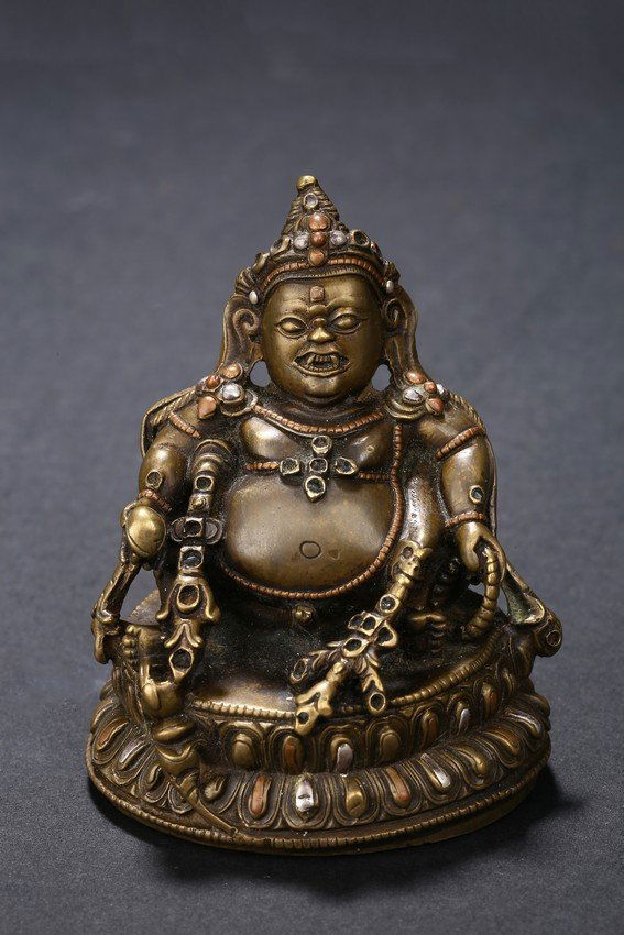 A SMALL BRONZE SILVER INLAID BODHISATTVA (1 of 5)