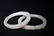A PAIR OF WHITE JADE DRAGON BRACELETS - 3