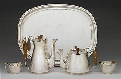 ANTON MICHELSEN STERLING SILVER TEA & COFFEE SET: Danish silver five-piece tea and coffee service Soren Sass for Anton Michelsen, Copenhagen, 20th century Comprising a tea and coffee pot with swan-neck spouts, teak handles and finials, sugar and crea