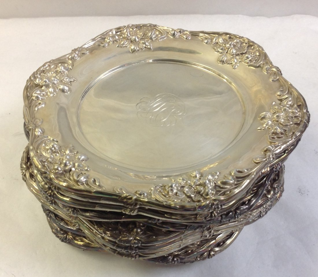 SET OF TWELVE STERLING SILVER DESSERT PLATES: SET OF TWELVE STERLING SILVER DESSERT PLATES.The plates are 7&1/2 inches in diameter & the weight is 56 Troy ounces.