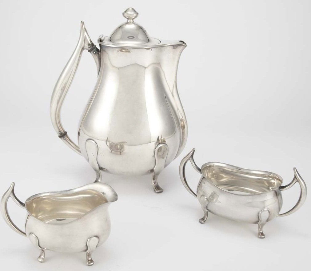 DAVID ANDERSEN STERLING TEA SERVICE NORWAY: NORWEGIAN STERLING SILVER TEA SET BY DAVID ANDERSEN CONSISTING OF TEAPOT, SUGAR & CREAMER BEARING MARKS D-A 925S NORWAY STERLING WEIGHING 32 TROY OUNCES.