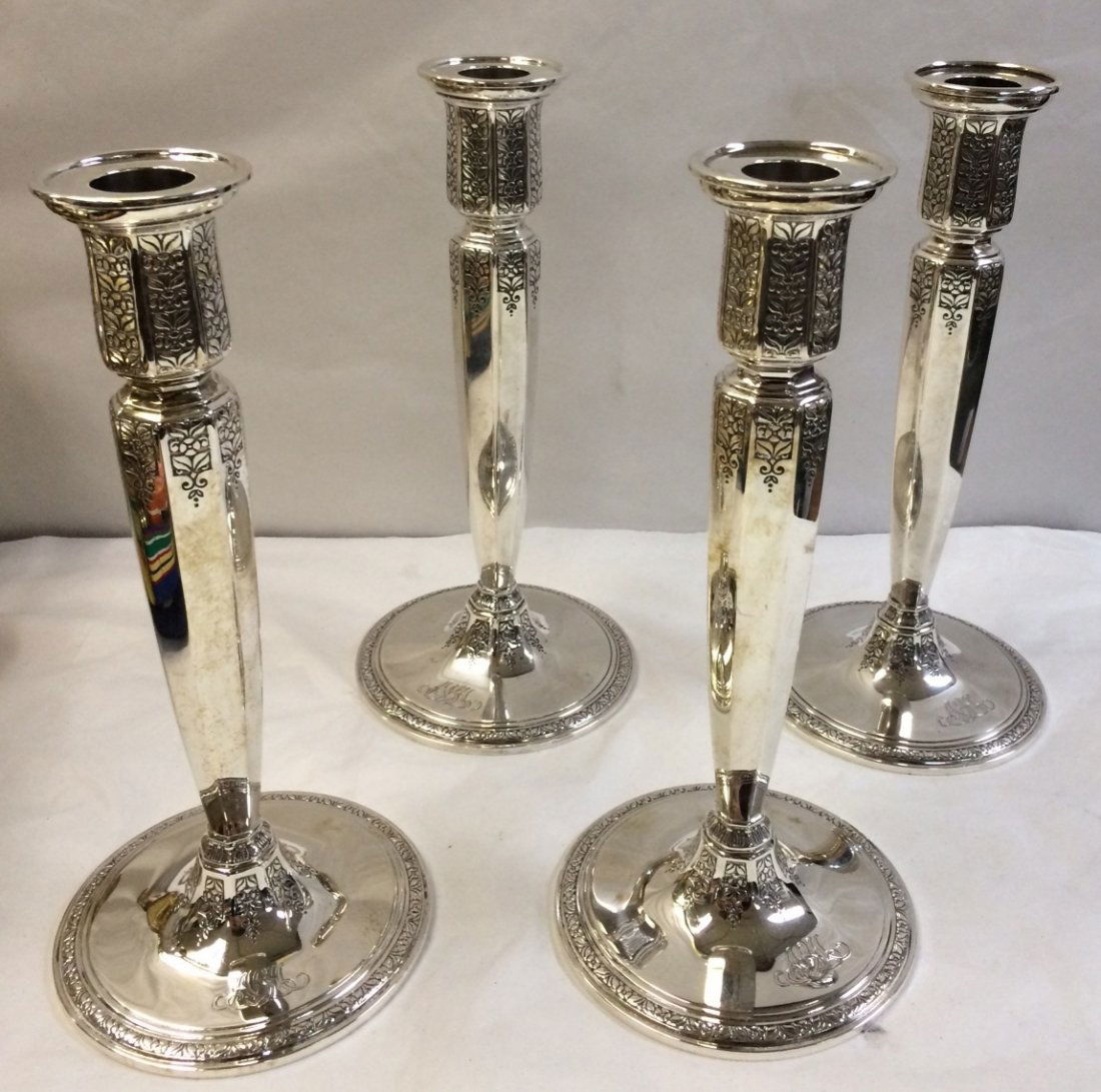 SET OF FOUR TIFFANY STERLING SILVER CANDLESTICKS