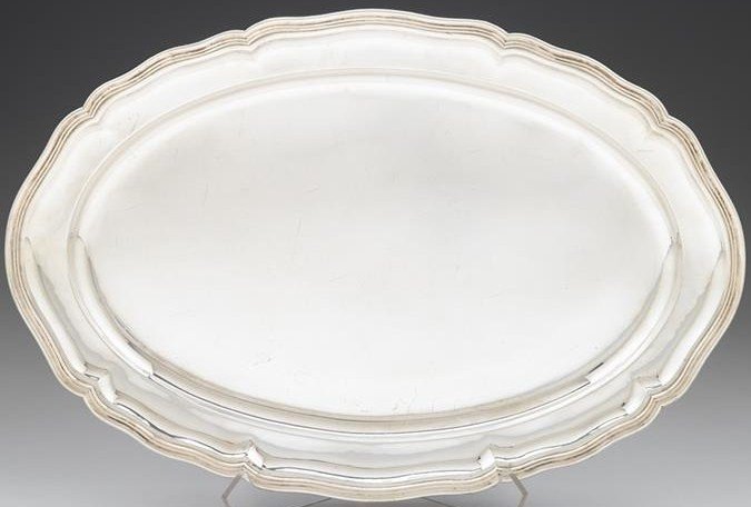 BUCCELLATI STERLING SILVER LARGE TRAY / WAITER: Large Italian BUCCELLATI STERLING silver SHAPED OVAL platter buccellati, milan, 20th century Shaped oval tray with reeded rim. L: 23 1/2, W:15 3/4 in. 66 oz.