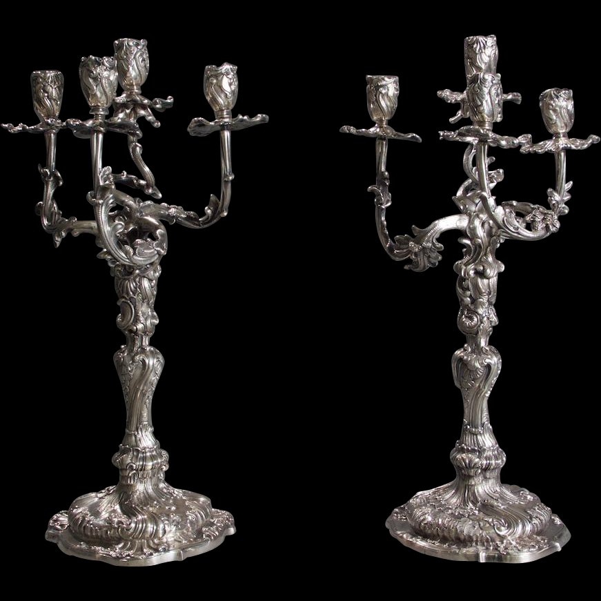 Pair German silver four-light candelabra Dresden, 19TH: A pair of German silver four-light candelabra Dresden, 19th century, maker's mark C.S. In 18th-century style, each on a shaped circular base, the baluster form stem supporting four branches, chased al