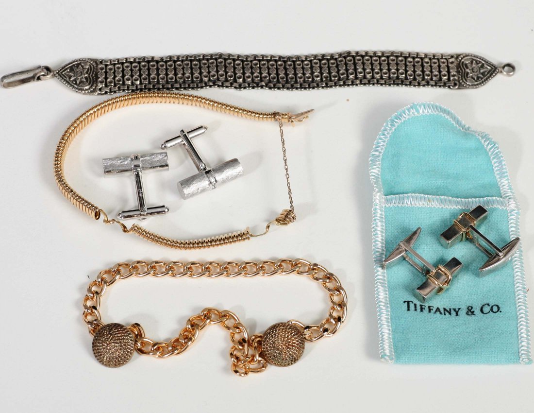 Gold and Silver Jewelry 14kt=14.6DWT: Mixed jewelry lot consisting of; Brushed 14kt white gold cufflinks 6.6DWT, Sterling silver cufflinks with gold bands marked 925-750 (18K) marked Tiffany & Co. with Tiffany marked bag, Middle Eastern S