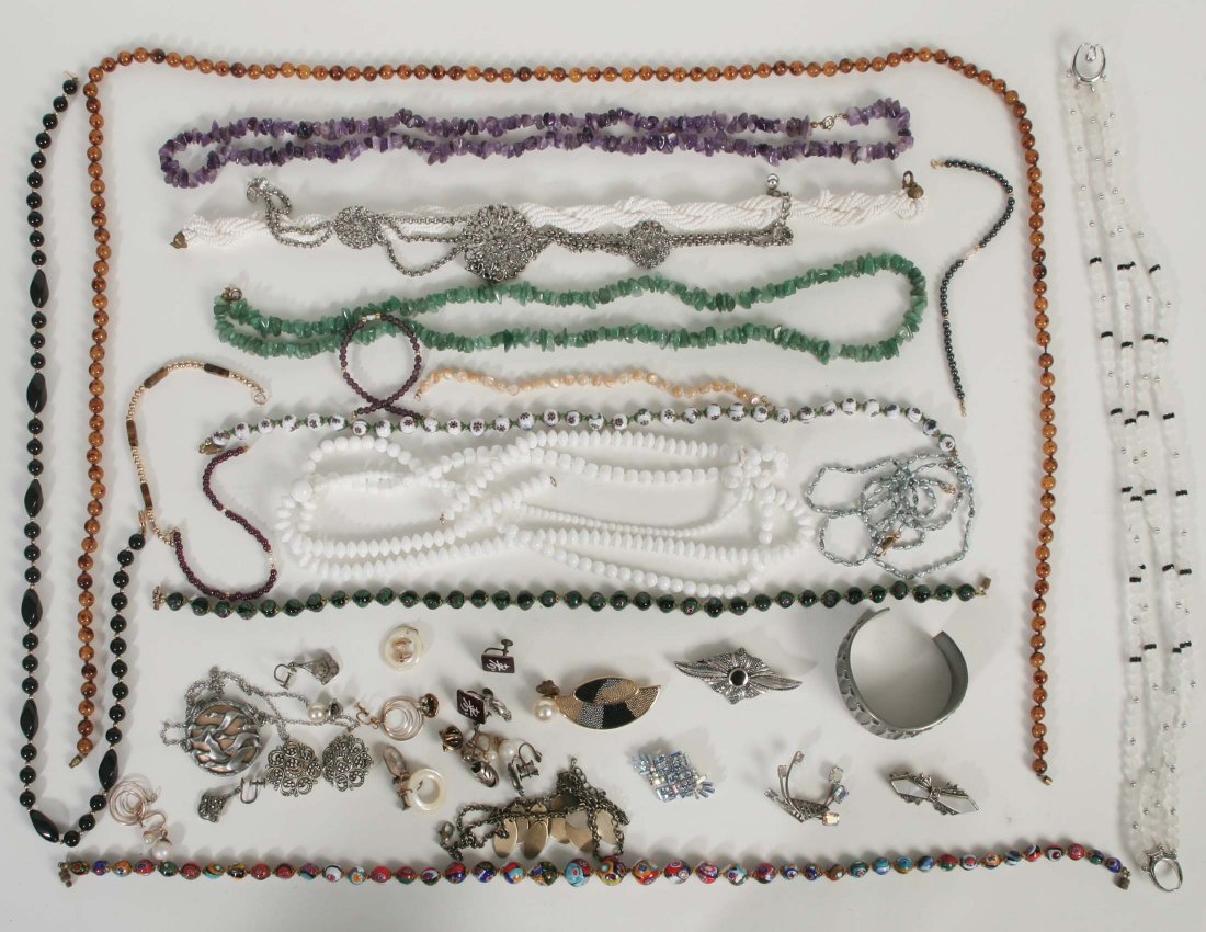 Mixed Jewelry Lot: Pewter cuff bracelet Norway, Assorted pins, Four strand white bead necklace with black and silver accents, Jade chip necklace, Amethyst chip necklace, White twisted necklace, Multi-color painted bead 
