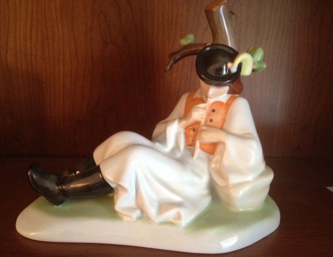 Zsolnay Figure of a Flute Player: Zsolnay Figure of a Flute Player, ht 7". From the estate of Mavis Lopater, to benefit the Hans and Mavis Lopater Foundation