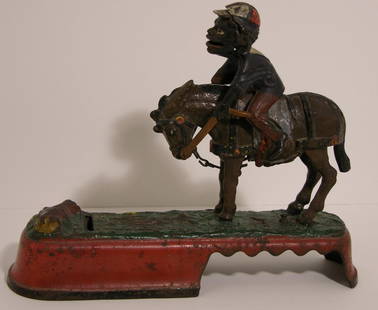 I Always Did 'Spise a Mule Mechanical Bank: This bank features a jockey on a mule. The bottom coin box cover says “PatD Feb 2 1875” while the case itself is marked “PATD Apr 22 1879”. The item has a great patina from its long history. T