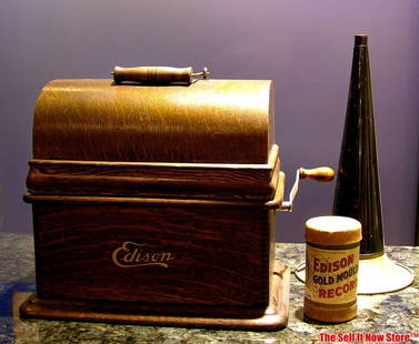 Edison Standard 2 / 4 Minute Cylinder Phonograph: This is an Edison Standard 2 and 4 minute cylinder machine with an oak cabinet. The player has been tested and does play. It includes a single cylinder and horn as shown. The horn is 14" long and 6-7/