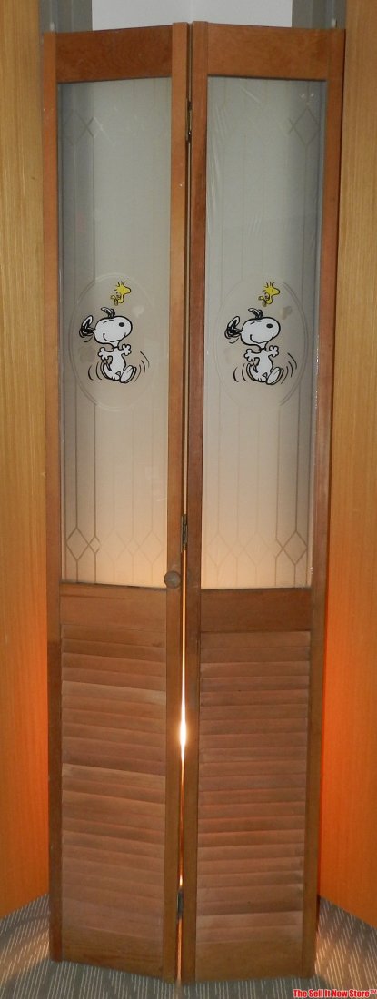 Peanuts Snoopy & Woodstock Bi-Fold Doors: This is a pair of vintage Peanuts Snoopy & Woodstock bifold doors. They are in great shape and were purchased years ago but never installed. One still has the protective film on the back of the glass.