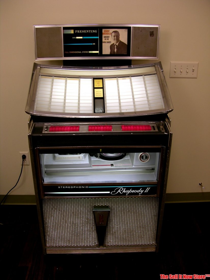 1963 Survivor Rock-ola 418 - S Coin Operated Jukebox: Survivor Rockola 418-S Juke box. This survivor is from a long term owner and is in nice shape. It does not play but probably not far from playing. Good glass, and the cabinet is very solid. This is on
