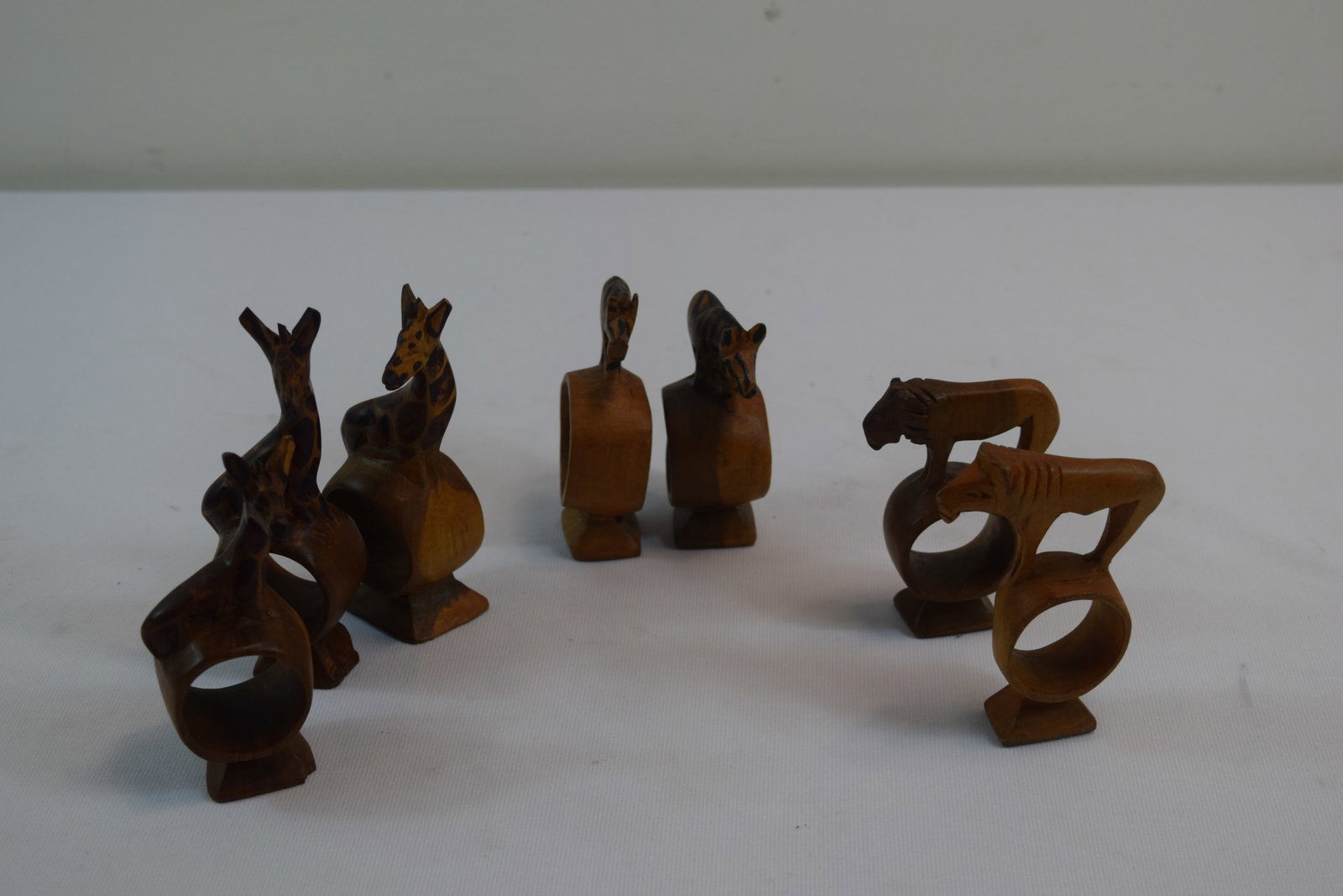 LOT of 7 Handcarved African Animal Napkin Holders (3 Giraffes, 2 Zebras, 2 Lions): LOT of 7 Handcarved African Animal Napkin Holders (3 Giraffes, 2 Zebras, 2 Lions)