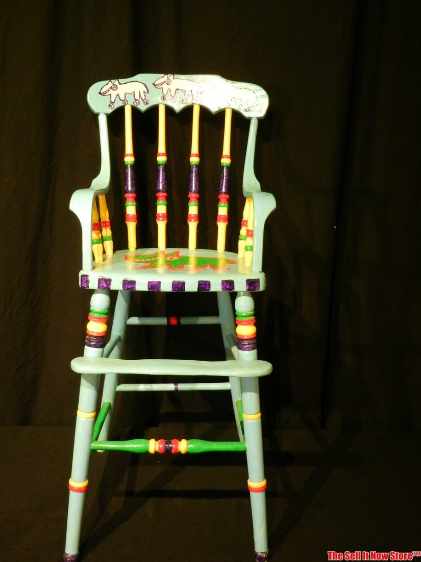 Dennis Pearson Beastie Painted Highchair: Dennis Pearson Beastie painted wood highchair. This piece features vibrant paint with Pearson's well-know Beasties on a wood chair. The chair stands 36-3/4" high by 15" wide and 14" deep
