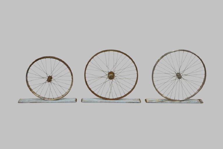 bicycle-rim-mounted-on-board-x-3-24-3-4-x-26-1-2