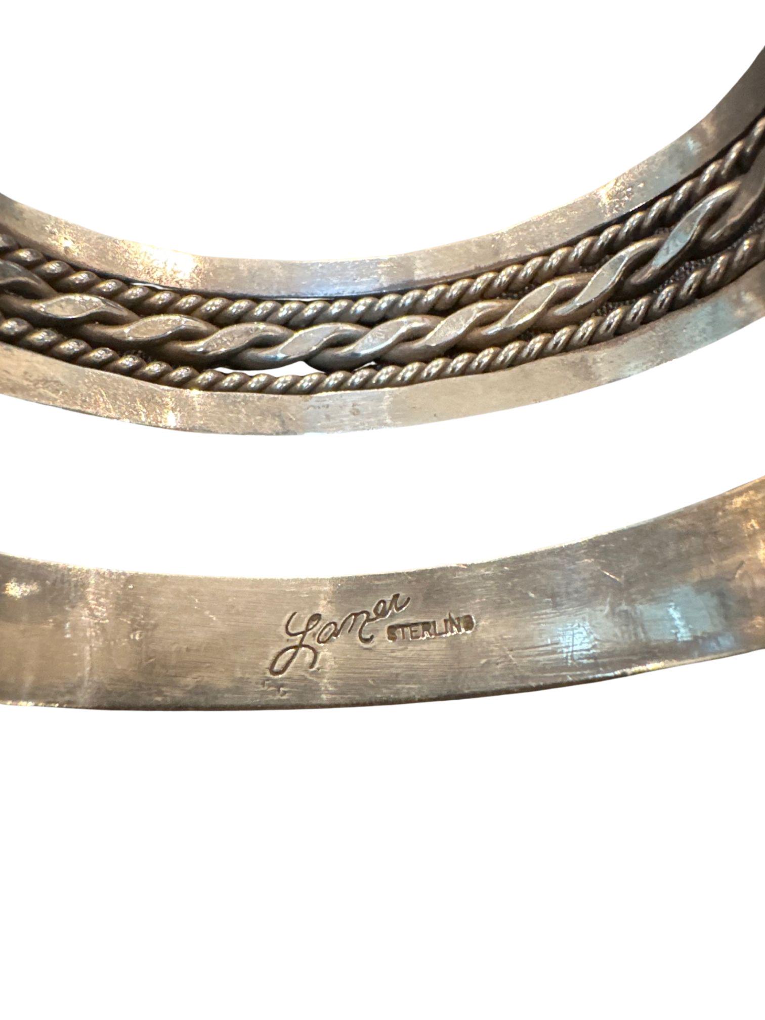 2 piece Lot of Silver Cuff Bracelets one is marked "Laner";  1/2" wide; second bracelet 3/4" wide (1 of 4)
