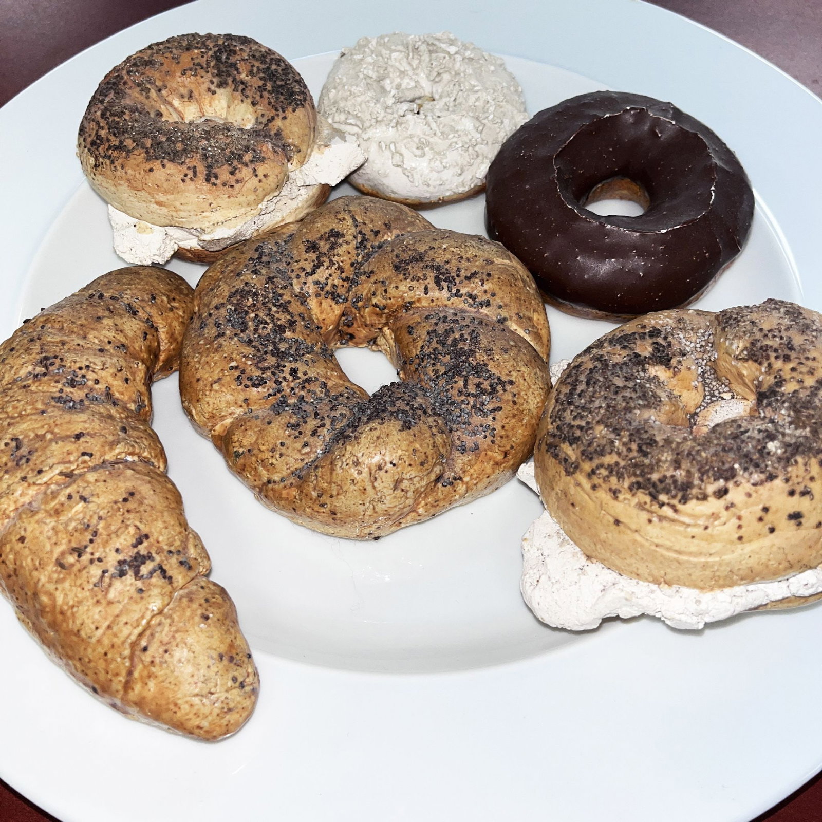 David Gilhooly - Baked Goods: Artist: David Gilhooly Title: Chocolate Glaze Donut Year: 1972-1980 Dimensions: Edition: Original one-of-a-kind work of art Medium: Glazed earthenware with Inc