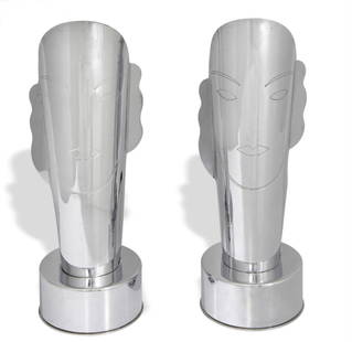 Erte - Face Table Lamp pair: Artist: Erte Title: Face Table Lamp pair Year: c. 1930s Dimensions: 3 1/2in. by 10in. Weight: 0 Medium: Chrome plated steel Condition: As Is