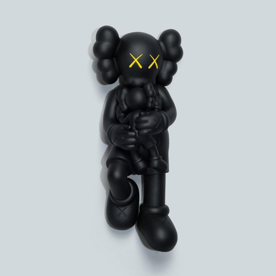 KAWS - HOLIDAY SINGAPORE (Black): Artist: KAWS Title: HOLIDAY SINGAPORE (Black) Year: 2021 Dimensions: 10.5in. by 5.25in. Edition: From the Rare Limited Edition Suite: Singapore Mediu