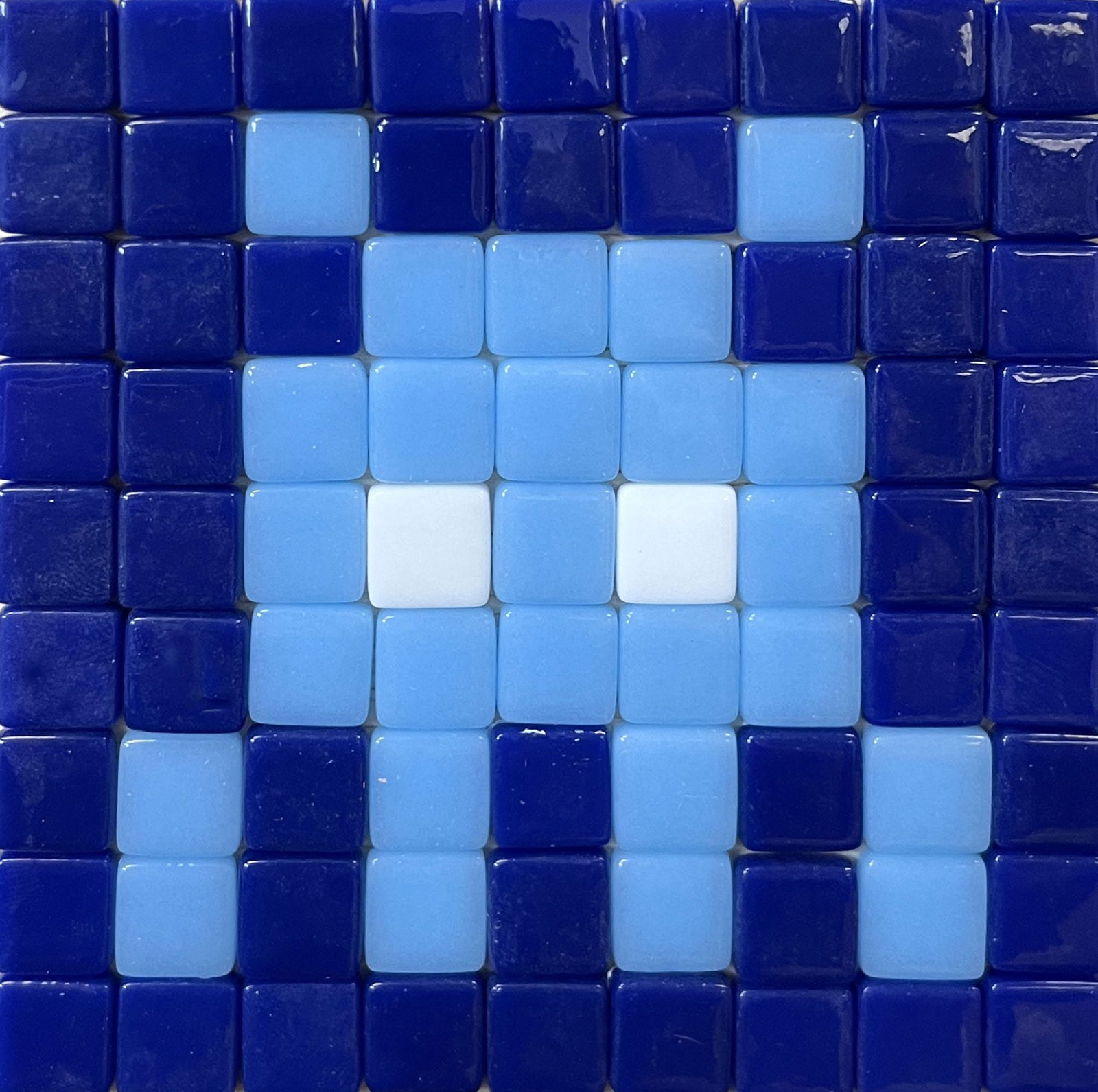 Matthew Steinberg - Skull: Artist: Matthew SteinbergTitle: SkullYear: 2015Dimensions: 4 1/4 x 4 1/4 x 1/2 in.Edition: Original Work of ArtSuite: WalkersMedium: Ceramic Mosaic on Wood PanelCondition: ExcellentComes with Letter