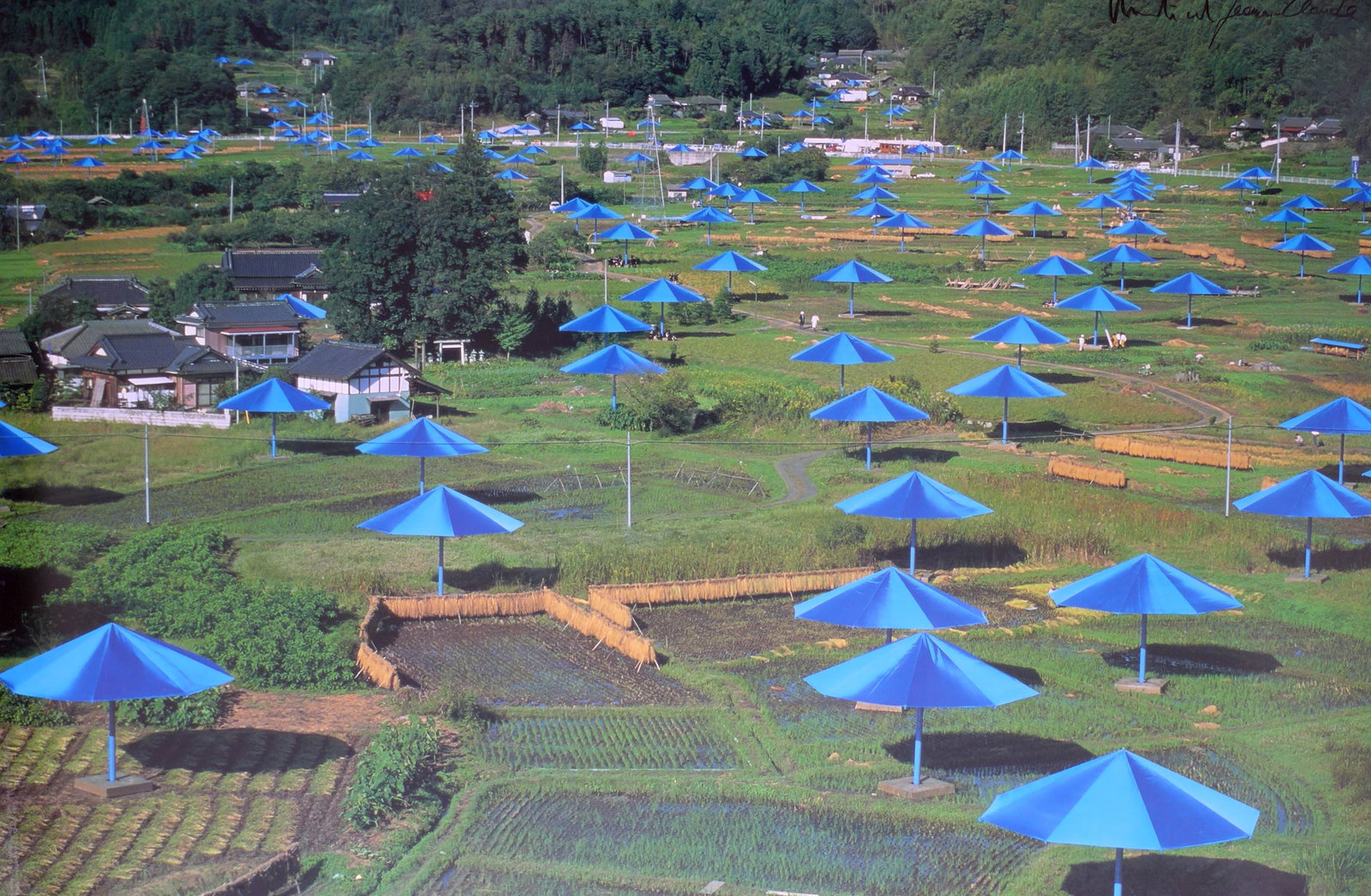 Christo - The Umbrellas, Ibaraki, Japan: Artist: ChristoTitle: The Umbrellas, Ibaraki, JapanYear: 1991Dimensions: 25 x 37 in.Edition: From the rare limited editionMedium: Original offset lithograph on paperCondition: ExcellentSignature