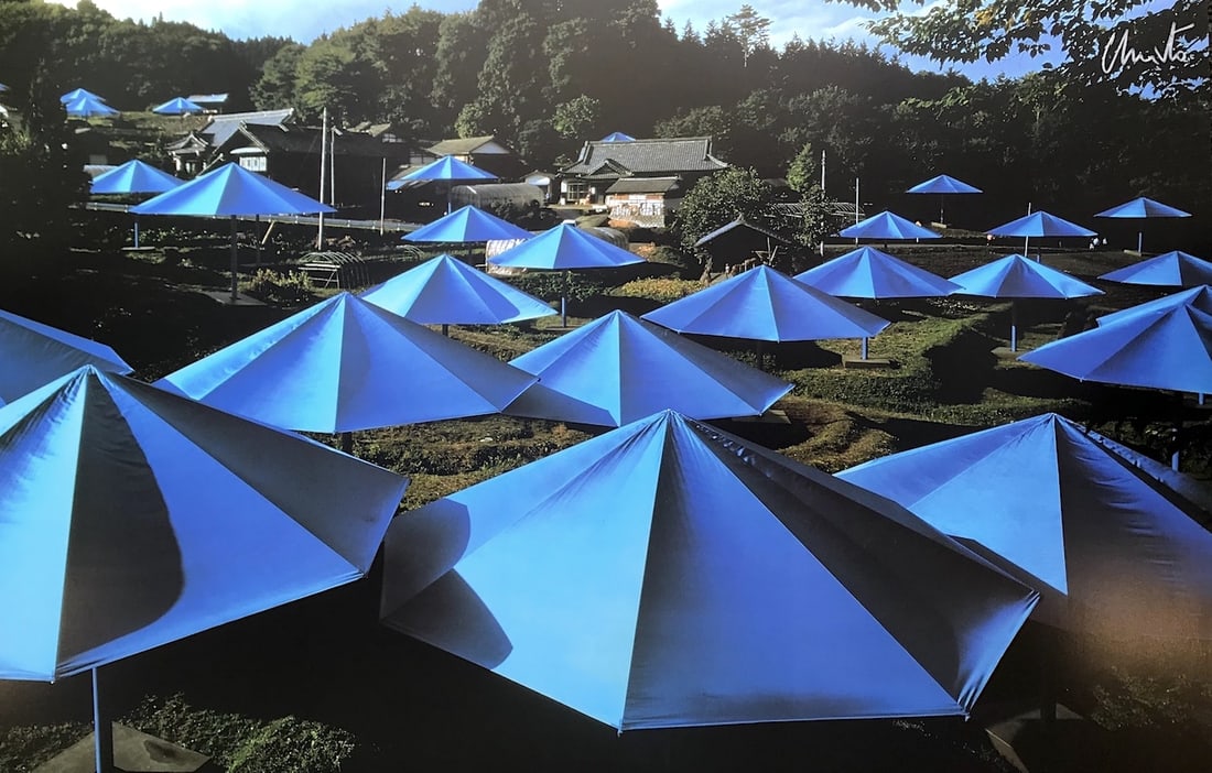 Christo - The Umbrellas Japan II: Artist: Christo Title: The Umbrellas Japan II Year: 1990 Dimensions: 39 x 24 in. Edition: From the rare limited edition Medium: Original offset lithograph on paper Condition: Excellent Signature