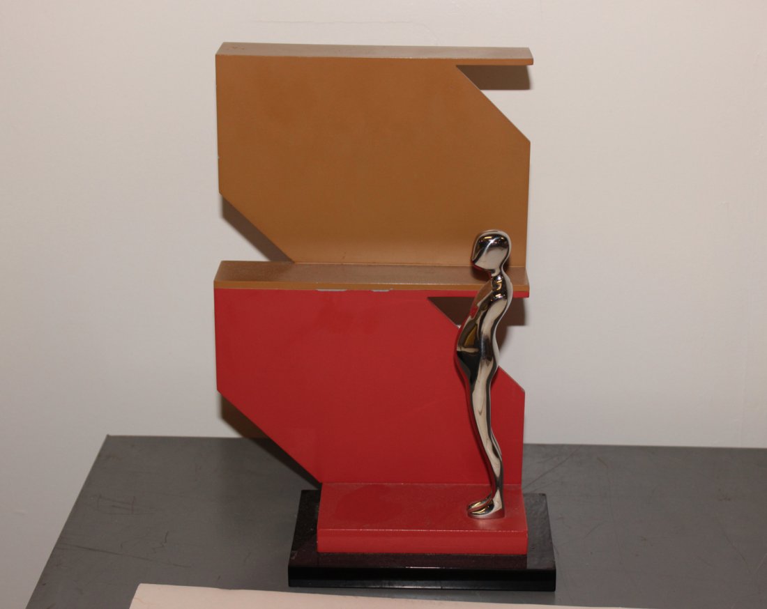 Ernest Trova statue: Artist: Ernest Trova Medium: Steel and bronze sculpture Year: 1984 Size: 5" x 3" x 9 1/2" Edition: From the rare limited edition AP of 3 Signature: Signed, numbered, and inscribed COA provid