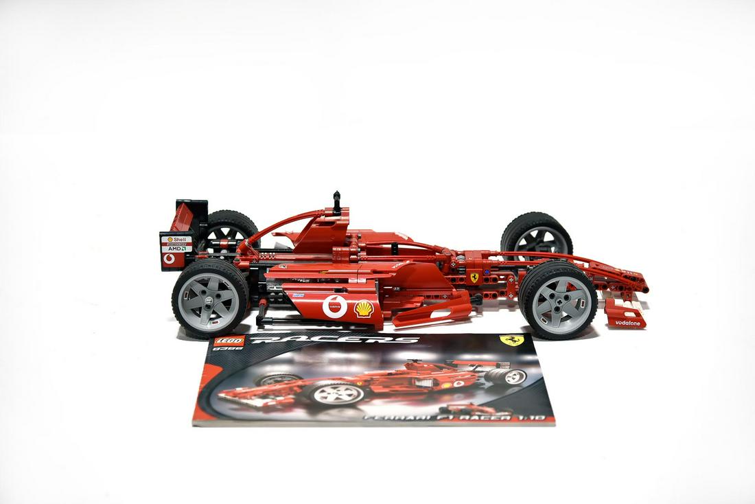 Lego Racers 8386 Ferrari F1 with Manual: Lego Racers 8386 Ferrari F1 with Manual - Offered Without Reserve - There is NO ESTIMATE on this item. - Lego Racers 8386 Ferrari F1 with Manual. It is unknown if it is missing any pieces. It measures