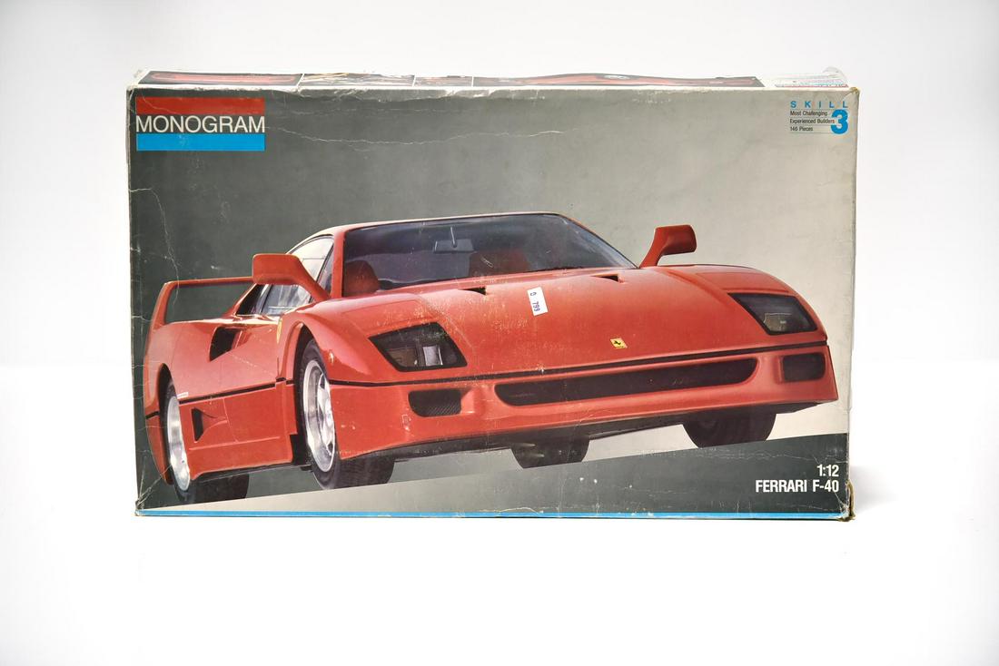 Monogram Ferrari F40 Plastic Model in Box: Monogram Ferrari F40 Plastic Model in Box - Offered Without Reserve - There is NO ESTIMATE on this item. - Monogram Ferrari F40 Plastic Model in Box. The box has wear and it has been opened. It is unk