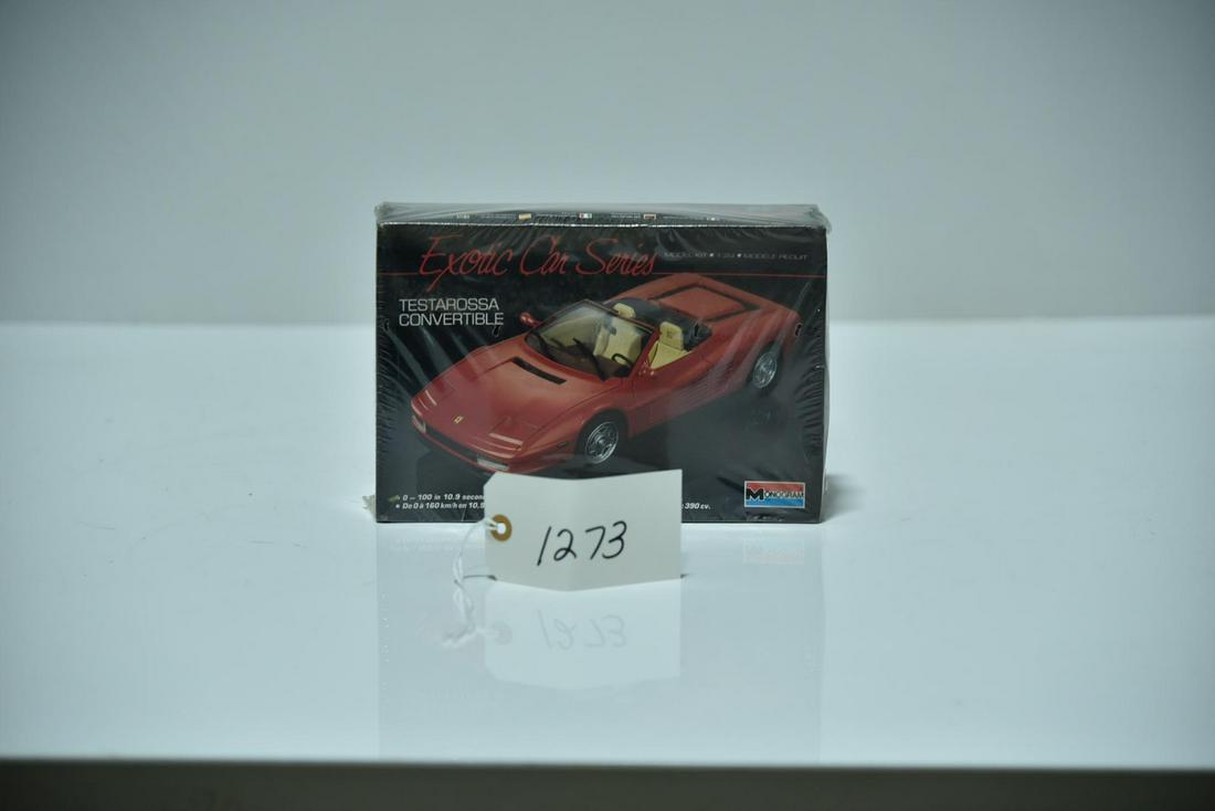 Sealed Monogram Testarossa Convertible Plastic Model: Sealed Monogram Testarossa Convertible Plastic Model - Offered Without Reserve - There is NO ESTIMATE on this item. - Sealed Monogram Testarossa Convertible Plastic Model. The box has some wear.
