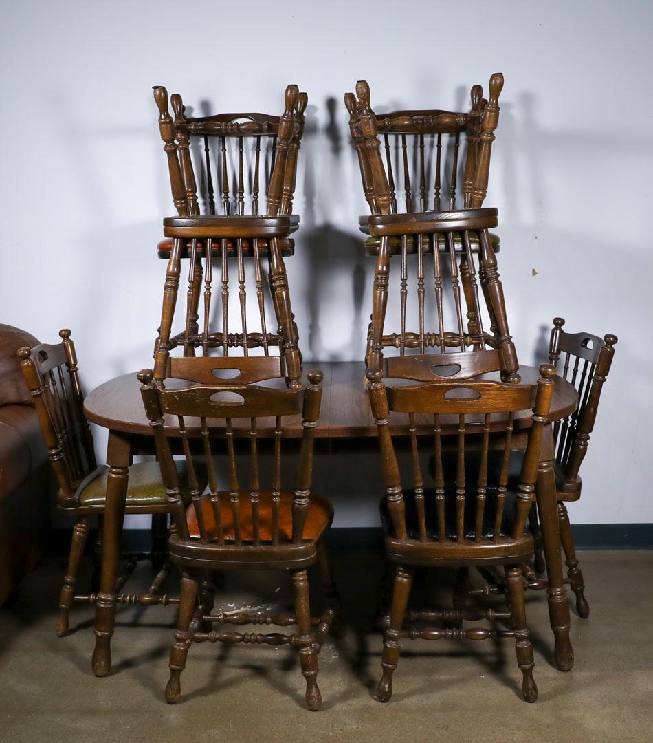 Wooden Table and 8 Chairs: Wooden Table and 8 Chairs - Offered Without Reserve58"L 41"W 29"H, Chairs are padded. Table includes two 11" leaves not shown in photos.